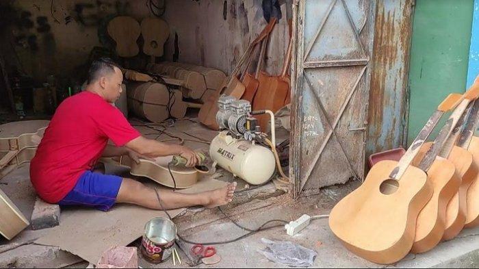 Alt="pengrajingitar"